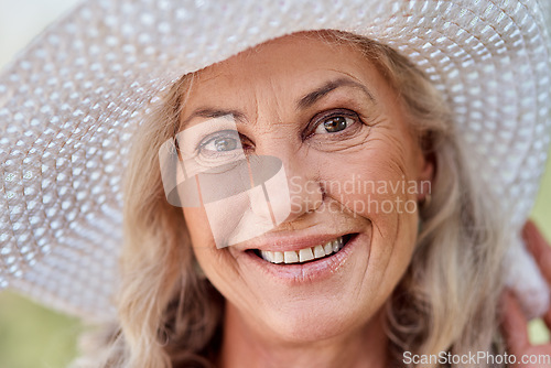 Image of Let me tell you something about the summer - its awesome. Cropped portrait of an attractive senior woman smiling while standing outdoors on a summers day.