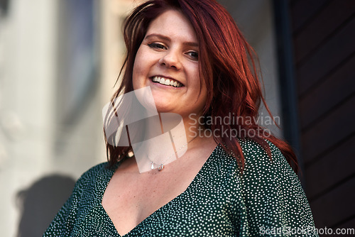 Image of All you need in life is fabulous red hair. Cropped shot of a beautiful young woman posing outdoors.