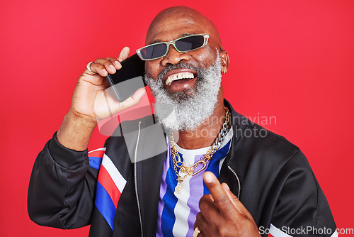 Image of Staying connected is important these days. Studio shot of a retro dressed man talking on the cellphone.