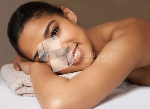 Image of Portrait of woman, smile or massage to relax for zen resting or wellness physical therapy in spa hotel. Face of happy girl in salon to exfoliate for body healing treatment or holistic detox therapy