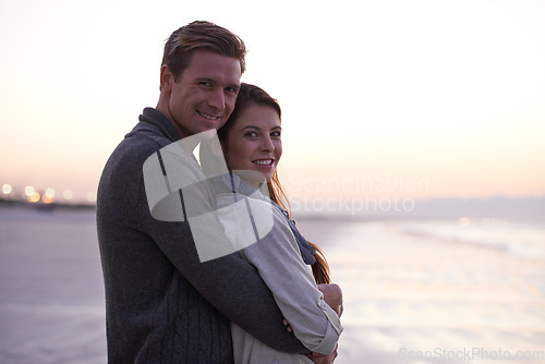 Image of Theres nothing like young love. A young couple enjoying a romantic moment together at the beach.