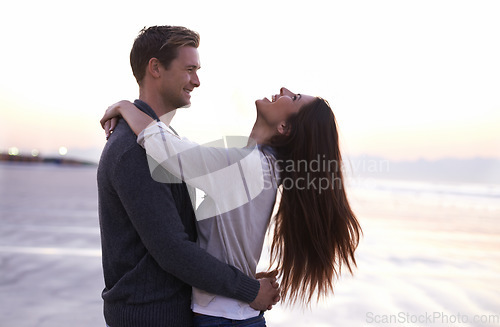 Image of Theres nothing like young love. A young couple enjoying a romantic moment together at the beach.