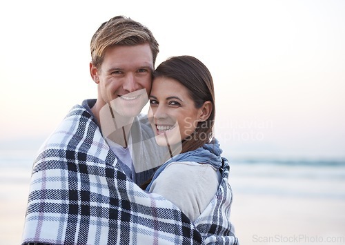 Image of Theres nothing like young love. A young couple enjoying a romantic moment together at the beach.