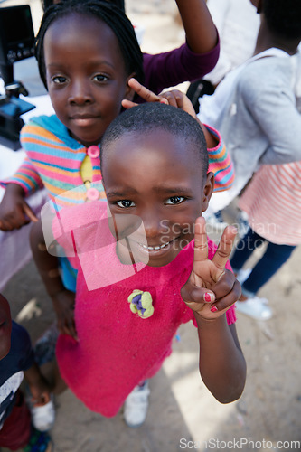 Image of The fun has arrived. Shot of kids at a community outreach event.