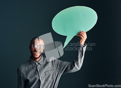 Image of Dont like what I have to say Too bad. Studio shot of a handsome young man holding a speech bubble.
