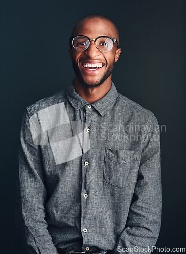 Image of Feel what you want to feel. Studio shot of a handsome young man against a dark background.