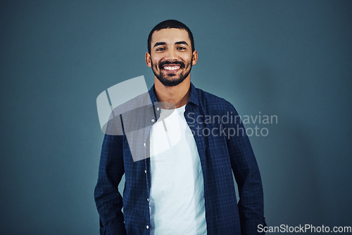 Image of Be confident in who you are. Studio portrait of a confident man posing against a gray background.