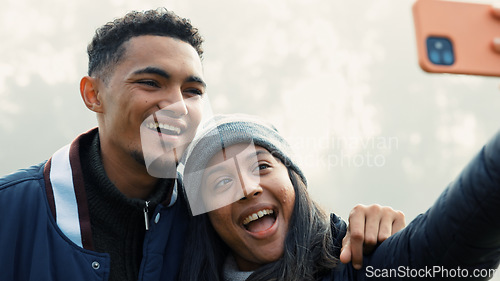 Image of Selfie, love and a couple hiking in nature together for adventure, fun or to explore the wilderness. Photograph, travel and young people bonding while posing for a profile picture on social media