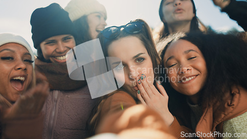 Image of Selfie, group of happy friends and camping adventure, hugging together with diversity and friendship. Smile on face, photography and women on nature camp to relax, laugh and outdoor winter vacation.