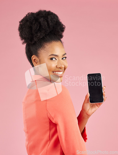 Image of Portrait of happy woman, phone and screen in studio for contact info, website promo or social media. Cellphone, mobile app and African model on pink background with online announcement, offer or deal