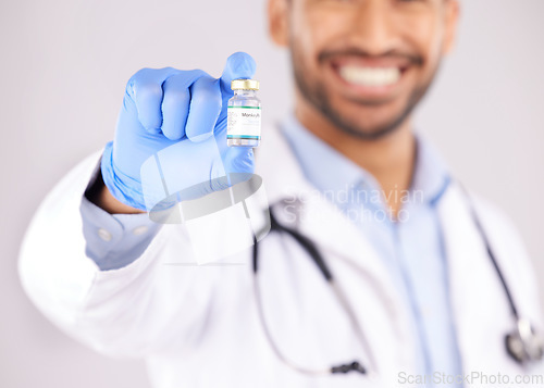 Image of Vaccine, doctor hands and monkeypox bottle for safety, medicine development and healthcare innovation in studio. Closeup of medical worker with vaccination, liquid vial and drugs for virus immunity