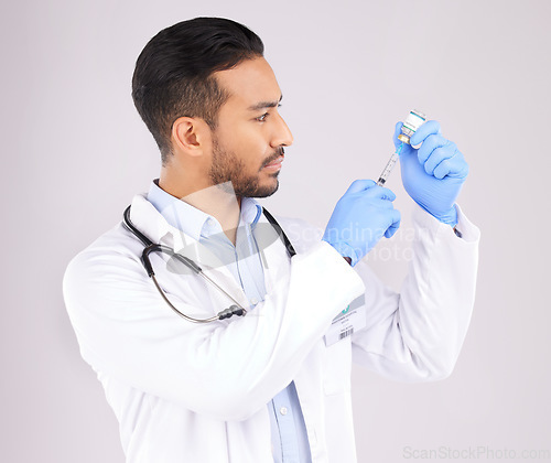 Image of Monkeypox vaccine, medical injection and doctor with medicine bottle, healthcare safety or immunity in studio. Asian man, hospital worker and needle for virus, vaccination or risk on white background