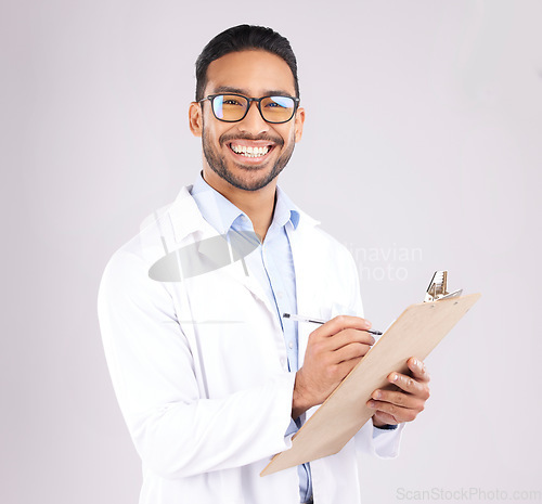 Image of Happy man, portrait or doctor with clipboard in studio, planning notes or healthcare information. Asian medical worker smile with report of insurance checklist, medicine or script on white background