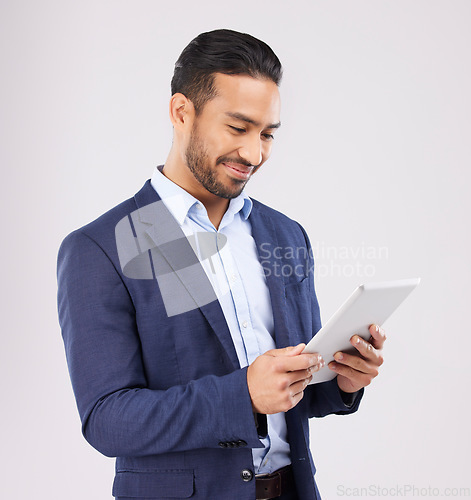 Image of Business, happy asian man and tablet in studio for planning research, trading data or stock market information. Corporate trader scroll on digital technology for financial website on white background