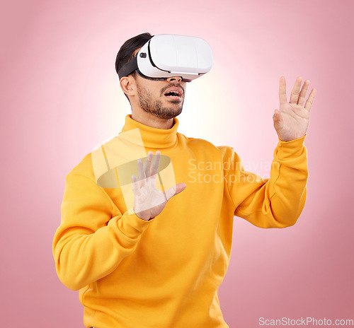 Image of VR, glasses and man vision on studio pink background for software, digital world or user experience. Person with high tech gaming, wow and surprise for virtual reality, future technology or metaverse