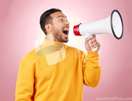 Image of Man, megaphone and voice for news, broadcast or student sale with wow announcement on studio pink background. Young person or gen z noise with call to action, university attention or college speaker