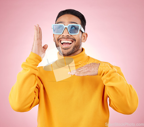 Image of Man, vogue dance and sunglasses in studio with excited smile, thinking and clothes for aesthetic by pink background. Asian gen z student, happy or color lens for fashion, dancing or ideas for party