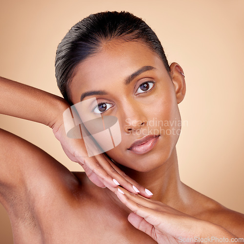 Image of Skincare, beauty and portrait with indian girl for glow or self care in brown studio, background. Dermatology, girl and natural cosmetic with spa treatment for luxury facial in mock up for wellness.