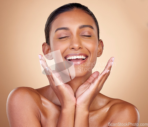 Image of Relax, skincare or happy woman with natural beauty or facial glow with dermatology cosmetics in studio. Eyes closed, wellness or face of Indian girl model laughing with makeup, smile or self love