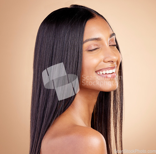 Image of Happy, hair and woman, beauty and shine with cosmetic care isolated on brown studio background. Female model smile, haircare and growth, cosmetology and texture with growth and salon hairstyle glow