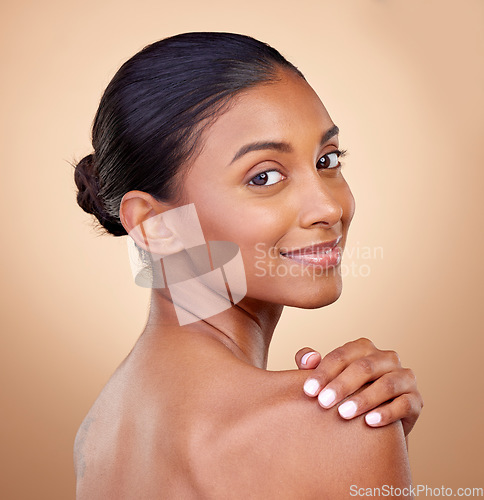 Image of Portrait, beauty or happy woman with natural facial glow with dermatology skincare cosmetics in studio. Aesthetic face, brown background or gen z girl model with wellness, smile or self love in spa