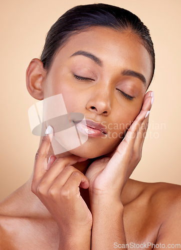 Image of Relax, skincare or Indian woman with natural beauty or facial glow with dermatology cosmetics in studio. Eyes closed, wellness or face of calm girl model resting or sleeping with makeup or self love