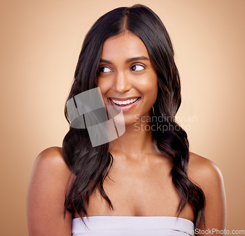 Image of Beauty, smile and hair style with face of woman in studio for cosmetics, salon and makeup. Happy, skincare and glow with female model on brown background for self care, spa treatment and shampoo