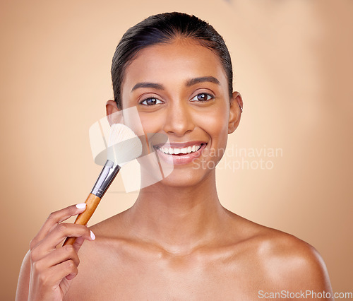 Image of Cosmetics, makeup and brush with portrait of woman in studio for facial, foundation and self care. Beauty, product and tools with face of model on brown background for glow, skincare and dermatology