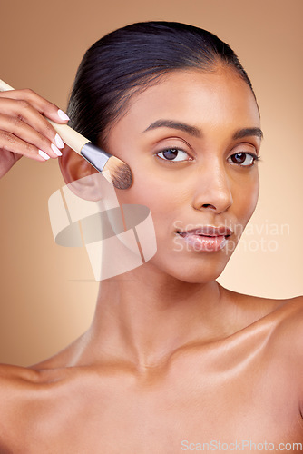 Image of Foundation, makeup and brush with portrait of woman in studio for facial, beauty and self care. Cosmetics, product and tools with face of model on brown background for glow, skincare and dermatology