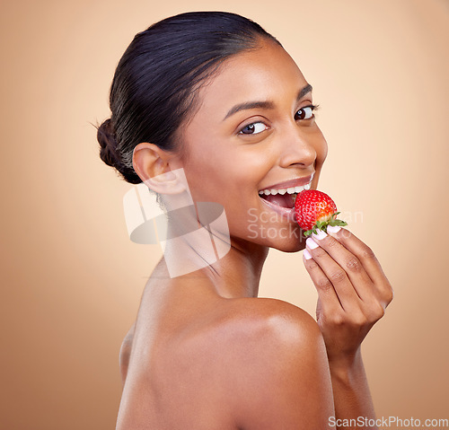 Image of Eating, strawberry and portrait of woman for skincare, natural beauty or benefits from healthy nutrition, diet and fruit. Girl, food and vitamin c for skin to glow, shine or wellness of body