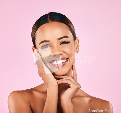 Image of Skincare, cosmetics and portrait of happy woman with makeup, wellness and glow on pink background. Beauty, dermatology and model with smile, luxury facial care and healthy spa aesthetic in studio.