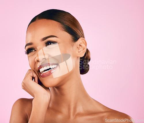 Image of Thinking, smile and woman with skincare, cosmetics and dermatology against a pink studio background. Female person, girl and model with makeup, ideas and facial with beauty, decision and aesthetic