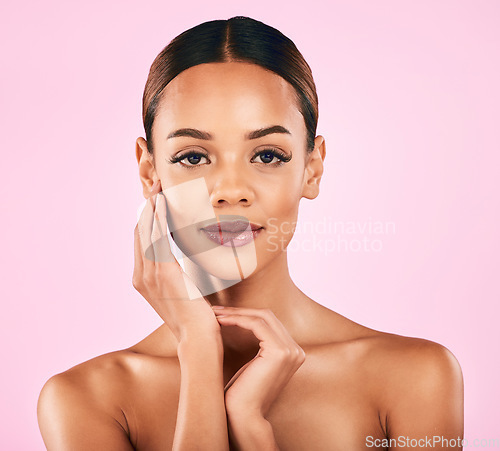 Image of Skincare, makeup and portrait of woman with facial wellness, natural beauty and glow on pink background. Cosmetics, dermatology and model with luxury skin care and healthy spa aesthetic in studio.