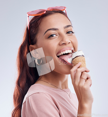 Image of Summer, ice cream and portrait of woman with smile in studio with dessert, snack and sweet treats. Happy, sunglasses and face of female person with cone in trendy accessories, style and cosmetics