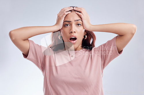 Image of Mistake, wow and young woman in studio with hand on head for anxiety, stress or panic. Portrait of a shocked female model person on a white background with gossip, bad news and problem or fail