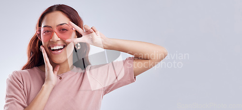 Image of Fashion sunglasses, portrait or happy woman with banner, smile or retro style isolated on white background. Mockup space, smile or cool gen z girl model with funky style or peace sign in studio