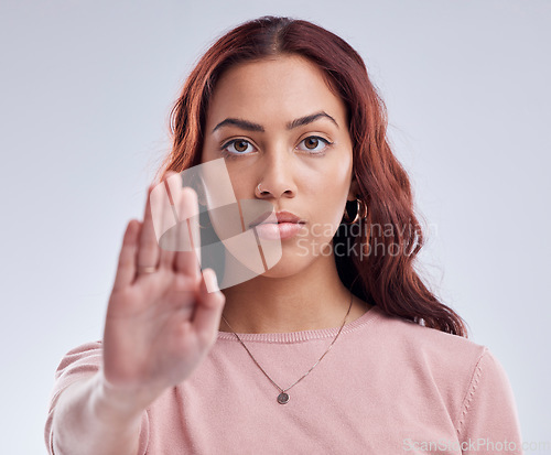 Image of Stop, hand and portrait of woman, danger and warning with censor and protest isolated on white background. Female person palm, caution and fight with wait sign, rejection and body language in studio