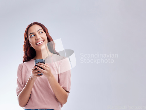 Image of Phone or mockup or happy woman on social media thinking of online dating or chat website for texting. Smile, banner space ideas or gen z female typing on mobile isolated on studio white background