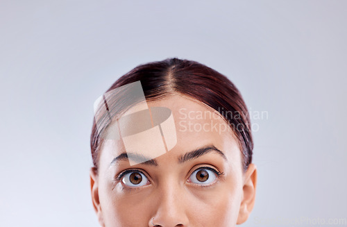 Image of Half face, beauty and skincare of woman in studio isolated on a white background mockup space. Portrait, natural and model with cosmetics in facial treatment for healthy skin, aesthetic and wellness