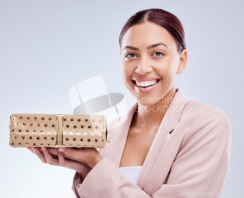 Image of Gift, smile and portrait of business woman in studio for shopping, surprise and birthday mockup. Wow, giveaway and prize with face of person and box on white background for package and present