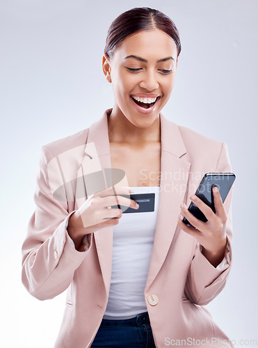 Image of Happy woman, credit card and smartphone for online shopping, excited about deal and fintech on white background. Female customer, smile with payment and e commerce, bank app and discount in studio