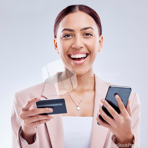 Image of Woman in portrait, credit card and smartphone for online shopping, excited for deal and fintech on white background. Female customer, happy with payment and ecommerce, bank app and discount in studio