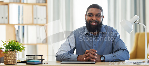 Image of Portrait of black man in office, desk smile with professional consulting and lawyer at advisory agency. Consultant, law firm attorney or happy and expert businessman in trust at workplace in Africa