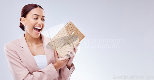 Image of Woman, wow and gift box for prize, giveaway celebration and surprise on studio, white background and banner mockup. Excited person or winner with present, package and retail shopping or competition