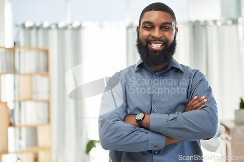 Image of Happy, portrait and a black man with arms crossed in an office for corporate and management business. Smile, working and an African accountant with pride and confidence in job and a finance company