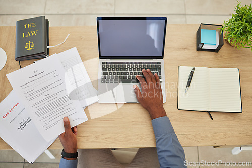 Image of Legal paperwork, lawyer hands and top view of desk, laptop mockup with contract and deal agreement. Partnership documents, PC and notebook, person at law firm and GDPR, website and notary report