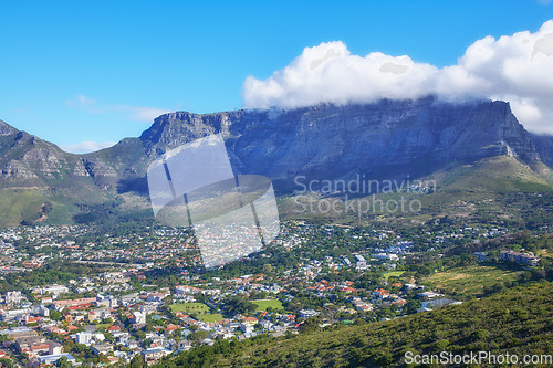 Image of Beautiful scene of table Mountain in Cape Town on a sunny day with copy space. View of a bright sky and cloud with cityscape in South Africa. Serene harmony in nature and peaceful landscape views