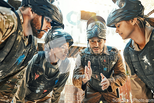 Image of Paintball team, meeting and idea for game plan, collaboration or strategy on the battle field together. Group of paintballers in war discussion, teamwork or speech for motivation before match start