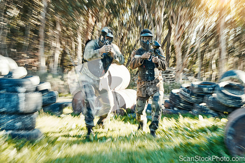 Image of Teamwork, fast and paintball with man in game for playground, motion blur and gaming. Challenge, mission and soldier with people shooting in battlefield arena for target, gun and warrior training