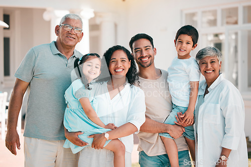 Image of Happy, big family and portrait of parents, kids and grandparents outdoor at house, home or backyard in summer. Man, woman and children with senior people with smile on face for quality time together